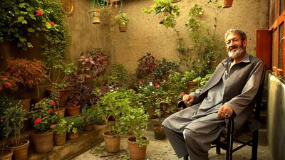 Ramesh, Kabul, 2015: "My father was head of an agricultural bank and the family were well-off. We had a huge house with an enormous garden. My father loved flowers and gardening, and I learnt his passion, helping him to weed and water after school. When he died, the security situation worsened, and my brother, who was working in the ministry of finance, left the country. I stayed and, after the fall of the Taliban, found a job as a gardener for a cultural organisation, where I worked until six years ago. As soon as I lost my job, I built this garden. I wanted to build one where we used to live but, well, it is just a road now. My father-in-law owns this land, but I built everything you see here.” Photo: Lalage Snow