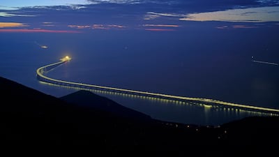 Hong Kong-Zhuhai-Macau Bridge is lit up in Hong Kong. The bridge, the world's longest cross-sea project, which has a total length of 55 kilometers, will have opening ceremony in Zhuhai. AP Photo