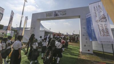 School children visit the festival.