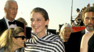 1988: Audrey Hepburn mixes monochrome spots and stripes for the 1988 Oscars. Getty Images