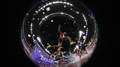 Athletes compete in the men's 3000m steeplechase heats during the World Athletics Championships in Tokyo on September 13, 2025. (Photo by Kirill KUDRYAVTSEV / AFP)