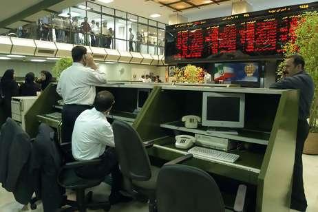 Traders at work at the Tehran Stock Exchange, which dropped to below the 9,000 mark for the first time in five years last week.