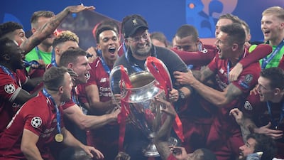 Klopp and his players with the European Cup. Reuters