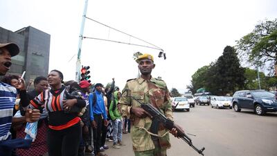 Soldiers on the streets as people, head for a solidarity rally, on the removal of Zimbabwean president Robert Mugabe, at the Zimbabwe Grounds in Highfield, Harare, Aaron Ufumeli / EPA