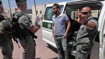 Israeli border police detain Palestinian construction workers in the ultra-Orthodox 'settlement' of Ramat Shlomo in East Jerusalem this week during an identity sweep on workers in this neighbourhood where the Jerusalem municipality intends to build an additional 1,600 housing units.