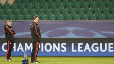 Manchester United manager Louis van Gaal observes his side during their Champions League training session on Monday in Wolfsburg. Carl Recine / Action Images / Reuters