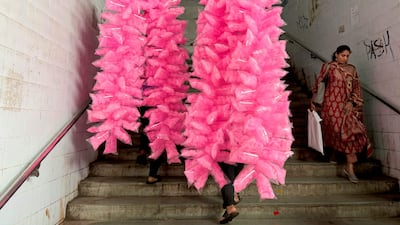 Sweet vendors at a railway station in Mumbai, India. AFP