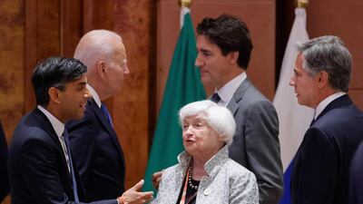 Britain's Prime Minister Rishi Sunak, US Treasury Secretary Janet Yellen, US President Joe Biden, Canada's Prime Minister Justin Trudeau and US Secretary of State Antony Blinken speak before the start of the second working session. AFP
