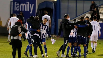 Alcoyano players celebrate their victory against Real Madrid. EPA