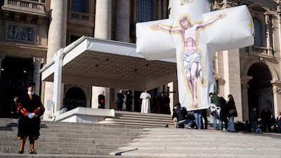 Pope Leo XIV is presented with an inflatable crucifix, offered to the Vatican by the Italian island of Ventotene. AFP