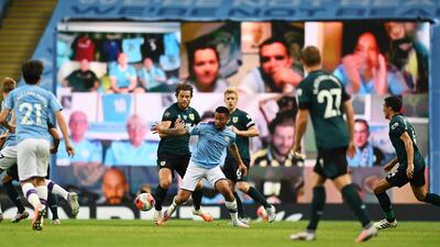 Gabriel Jesus (C) of Manchester City in action against James Tarkowski. EPA