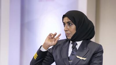 Salma Al Baloushi, Etihad’s first woman pilot, speaks during a panel at Etihad Training Academy on Tuesday. Reem Mohammed / The National