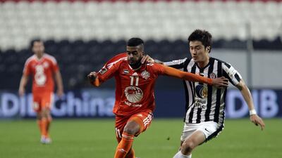 Midfielder Park Jong-woo, right, was all over the field for Al Jazira whether it was in attack or defence. Jeffrey E Biteng / The National