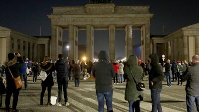 The Brandenburg Gate in Berlin, Germany is seen just after being dimmed during Earth Hour. Adam Berry / Getty Images