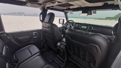 The test car featured half doors, with the top half being removable vinyl panels.