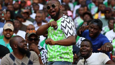 A Nigerian football supporter wearing the nation's replica home shirt during the international friendly match between England at Wembley. Catherine Ivill/Getty Images
