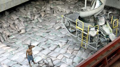 Sacks of sugar are loaded onto a ship at Brazil's main ocean port in Santos. Reuters