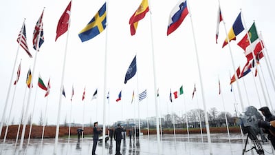 The Swedish flag is raised at Nato headquarters in Brussels on Monday. Reuters