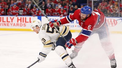 Buffalo Sabres forward Jeff Skinner, left, is checked by Montreal Canadiens defenceman Shea Weber during the third period of an NHL hockey game, in Buffalo. AP Photo