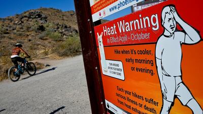 A sign warns of extremely high temperatures in Phoenix, Arizona. AP