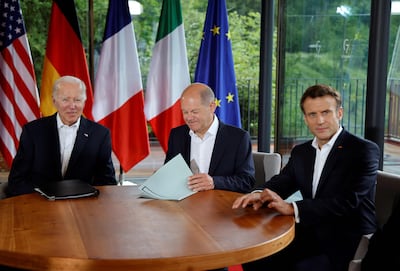 Liz Truss must work on forging more constructive relationships with global superpowers like the US, Germany and France. AFP