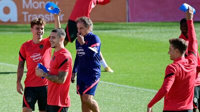 Atletico Madrid's Antoine Griezmann, left. AFP