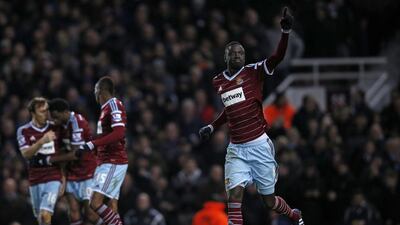 West Ham United midfielder Cheikhou Kouyate, right, celebrates after scoring the opening goal against Manchester United in their 1-1 Premier League draw on Sunday. Adrian Dennis / AFP