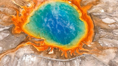 A bird's-eye view of the Grand Prismatic Spring in Yellowstone National Park, Wyoming. It is the largest hot spring in the US. Getty Images