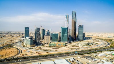 Above, skyscrapers at the King Abdullah financial district in Riyadh. Waseem Obaidi / Bloomberg