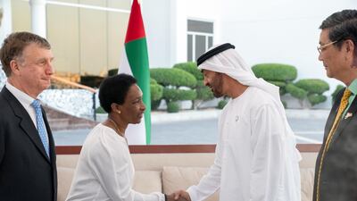 Sheikh Mohamed bin Zayed greets Loretta Claiborne at a Sea Palace barza.