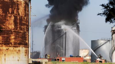Security forces blocked the main road to the site while firefighters tried to put out the blaze. Reuters