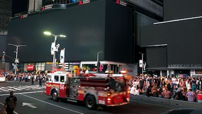 Times Square's billboards are dark after a power outage hit Manhattan in New York City. AFP