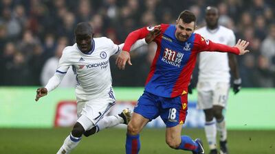 Chelsea’s French midfielder N’Golo Kante, left, vies with Crystal Palace’s Scottish midfielder James McArthur during the English Premier League football match between Crystal Palace and Chelsea at Selhurst Park in south London on December 17, 2016.Adrian Dennis / AFP
