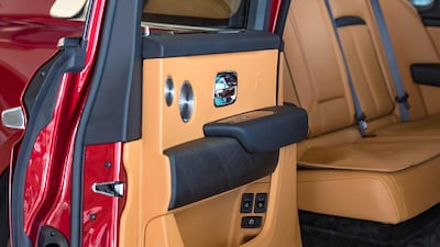 Rear "coach" doors that open in the opposite direction to regular doors are a Rolls trademark. Chris Whiteoak / The National