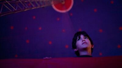 Sakher Sabbagh, 6, gets captivated by the show.