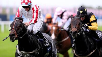 Wayne Lordan, left, rides Slade Power to win the British Champions Sprint Stakes, beating Graham Lee, right, on Jack Dexter at Ascot racecourse on October 19, 2013 in Ascot, England. Charlie Crowhurst / Getty Images