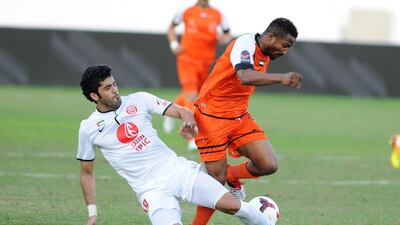 Bakari Kone, right, made an instant impact on debut for Ajman, helping the club end an 11-match winless streak, against Al Jazira last week.