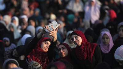 Palestinian attend prayers in Gaza City. AP Photo