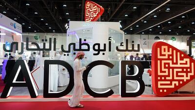 Abu Dhabi Commercial Bank (ADCB) and Union National Bank will merge and acquire Al Hilal Bank. Delores Johnson / The National