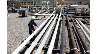 Oilfields and installations like this one in the Kurdish Autonomous Region are the focus of disputes between the Iraqi government and global oil companies, a reader notes. Hadi Mizban / AP