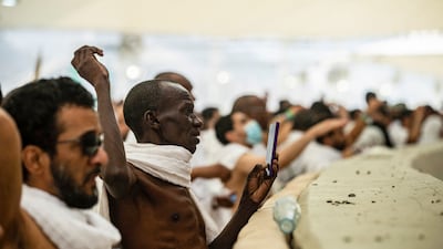 Pilgrims perform the stoning of the devil ritual as this year's expanded Hajj comes to an end. AFP