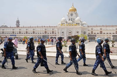 Indian Rapid Action Force personnel patrol ahead of Operation Blue Star anniversary outside the Golden Temple in Amritsar on June 4. AFP