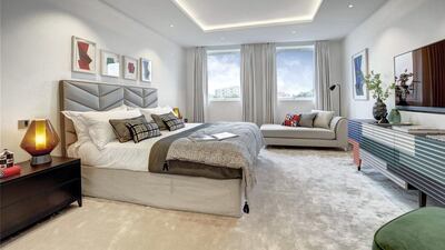 The principle guest suite (bedroom two) offers a private dressing area and shower room. This is accompanied by another guest bedroom with en suite bathroom and wardrobe storage. Courtesy Berkshire Hathaway HomeServices London