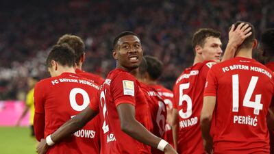 David Alaba celebrates a goal with Bayern Munich teammates. Getty Images