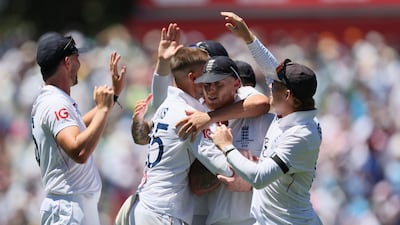 England all-rounder Will Jacks, centre, celebrates claiming the wicket of Australia's Usman Khawaja. AP
