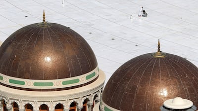 Muslim pilgrims head to pray the Friday prayer inside the Grand Mosque, in Mecca, Saudi Arabia, Friday, Nov. 4, 2011. The annual Islamic pilgrimage draws three million visitors each year, making it the largest yearly gathering of people in the world. The Hajj will begin on November 5. (AP Photo/Hassan Ammar) *** Local Caption *** Mideast Saudi Arabia Hajj.JPEG-00a67.jpg