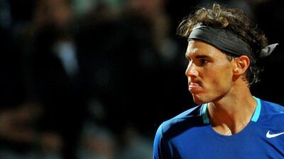 Rafael Nadal reacts during his match against Andy Murray during the Rome Masters quarter-final match at the Foro Italico on Friday. Tiziana Fabi / AFP / May 16, 2014