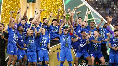 Al Hilal players celebrate winning the King's Cup final against Al Kholood at the King Abdullah Sports City Stadium in Jeddah. Getty Images