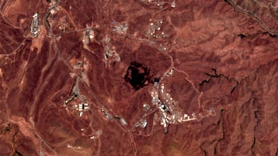 A June 26, 2020 photo from the European Commission's Sentinel-2 satellite shows the site of an explosion that appears to have charred hundreds of meters of scrubland. European Commission via AP