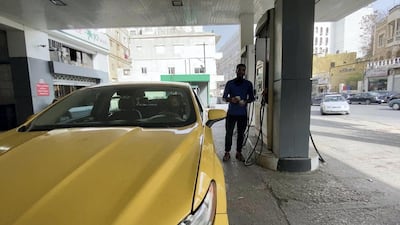 Taxi driver Razwan Najjar says his daily earnings go towards gas and car rental. Amy McConaghy / The National